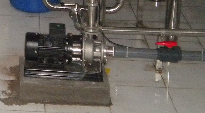 Water pump and motor installed at a small RO plant